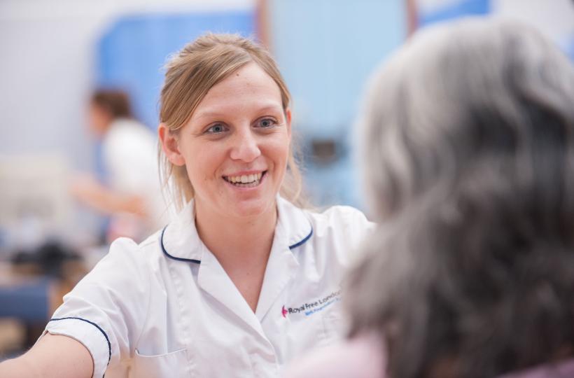 a physio talking to a patient